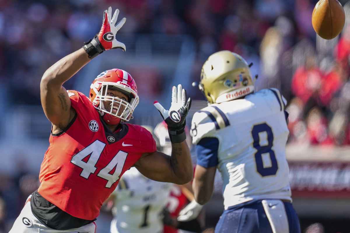 Nov 20, 2021; Athens, Georgia, USA; Georgia Bulldogs defensive lineman Travon Walker (44) rushes Charleston Southern Buccaneers quarterback Jack Chambers (8) during the first half at Sanford Stadium. Mandatory Credit: Dale Zanine-USA TODAY Sports